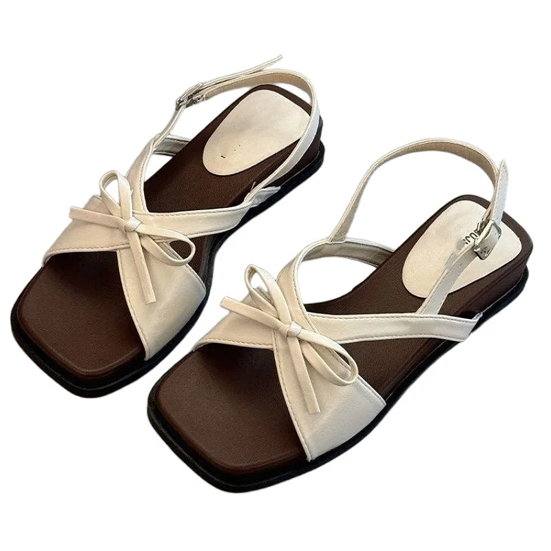 Sandalias de explosión para mujeres 2026 verano nuevo hermoso no cansado zapatillas con falda zapatillas de playa de fondo plano