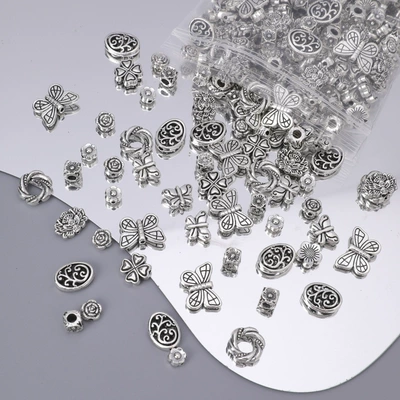 Xizang silver mixed diy torus spacer spacer 50g a pack of bracelet pendant alloy jewelry accessories string fish mixed bag (Zərgərlik ara hissələri) - mixed-love-flowers