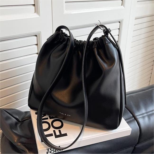 Bolso casual simple de alta calidad 2026 nuevo tipo de bolso de mujer, bolso de mochila de transporte universal, gran capacidad de bolso retro