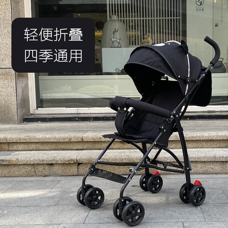 Cochecito de bebé de dibujos animados ultraligero y plegable, un cochecito de paraguas sencillo que se puede usar como cochecito de viaje de cuatro ruedas y como andador para bebés.