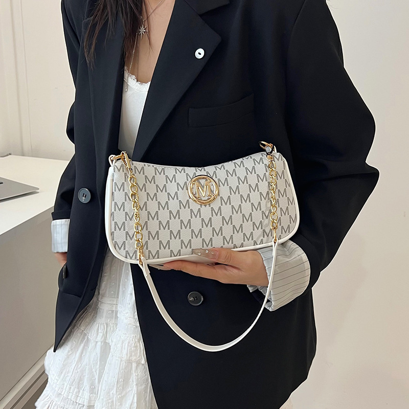 This Year's Fashionable 2025 New Niche Armpit Bag, Stylish and Personalized Shoulder Bag, Letter Printed Cross-Body Bag, Crescent Bag This Year's Fashionable 2025 New Niche Armpit Bag, Stylish and Personalized Shoulder Bag, Letter Printed Cross-Body Bag, Crescent Bag