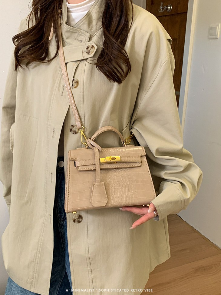 Bolso de mano caliente para mujeres 2025 nuevo estilo transfronterizo de alto nivel con patrón de cocodrilo lujoso y versátil bolso de hombro