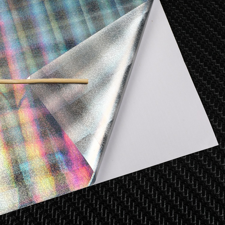 格子小细沙银镭射背胶.jpg