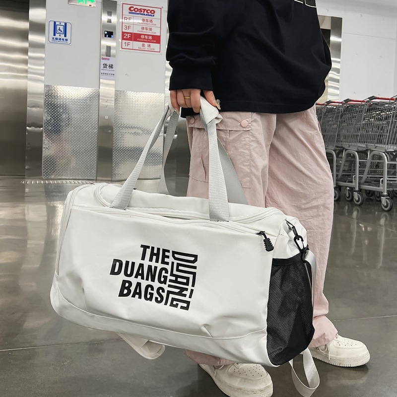 Fashionable trend capacious handheld design travel bag to go out