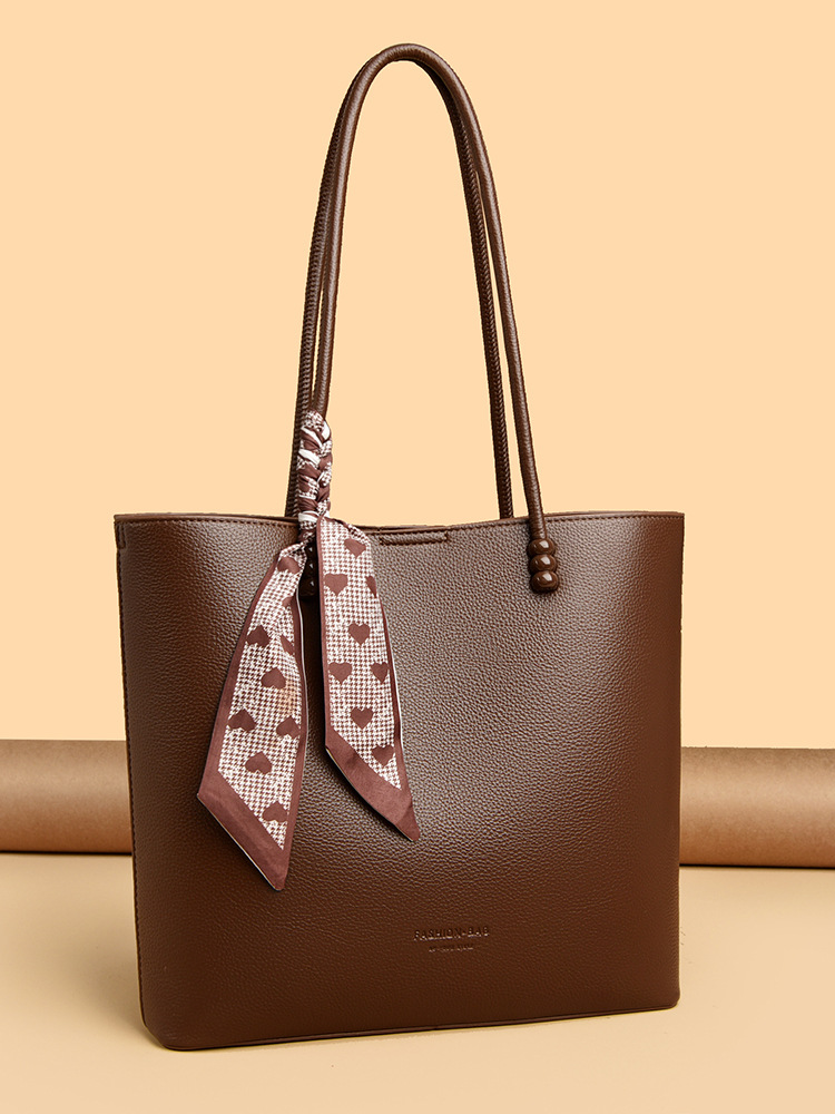 2025 nuevo bolso de mujer bolso de brazo coreano bolso especial bolso de color sólido bolso simple bolso de hombro bolso de viaje universal