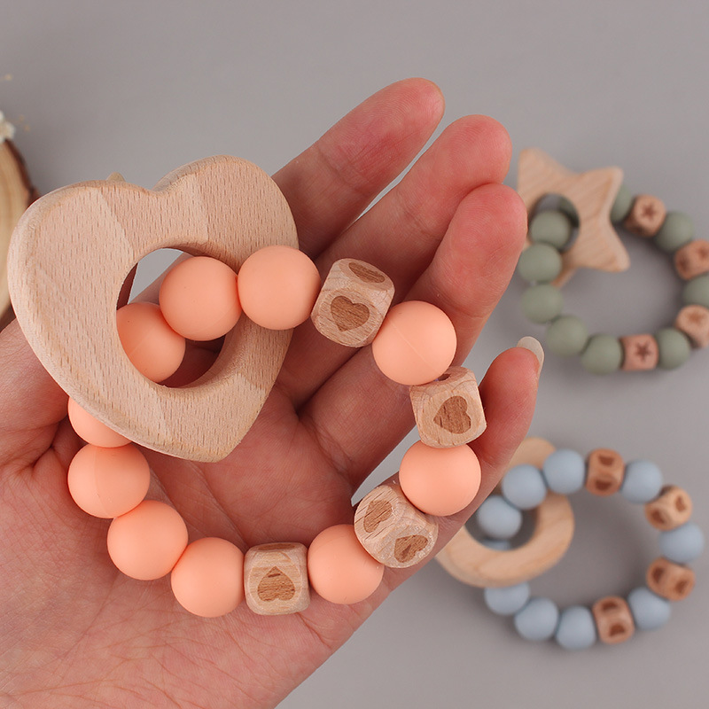 La pulsera de mordedor para bebé de juguete de haya 2025 puede morder el mordisco del bebé