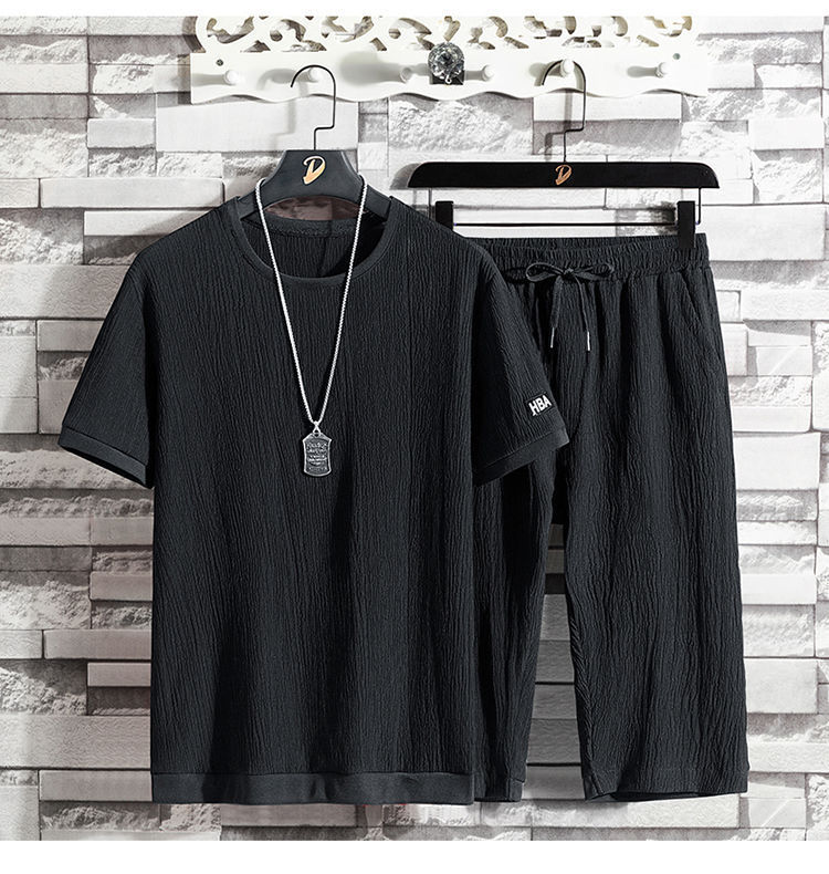 Un juego completo de camisetas de manga corta para hombres de verano relajado deportivo casual, pantalones cortos de siete puntos, dos conjuntos