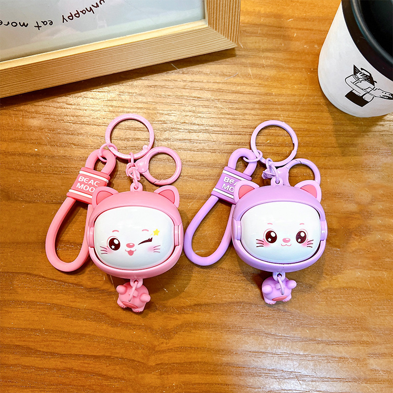 Llavero creativo de dibujos animados girando música lindo descompresión cambio de cara llavero de gato bolsos para hombres y mujeres pequeños regalos al por mayor