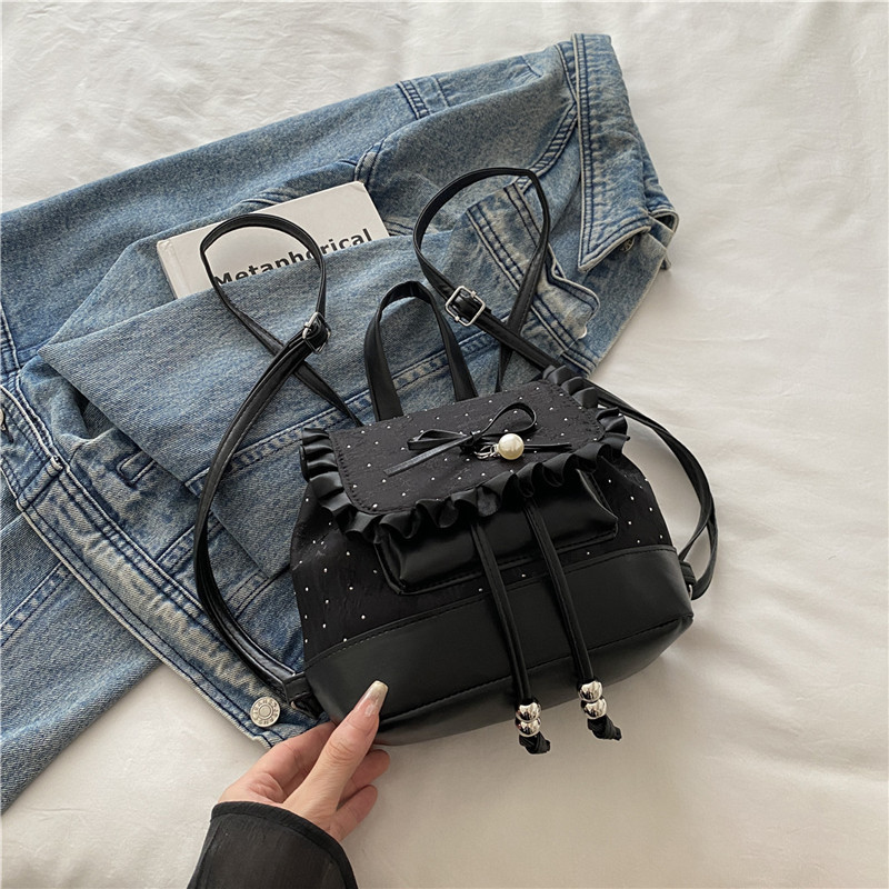 Bolsa de mano de moda coreana de chicas 2025 nuevo encaje de alto valor de la cara, mochila de hombro versátil