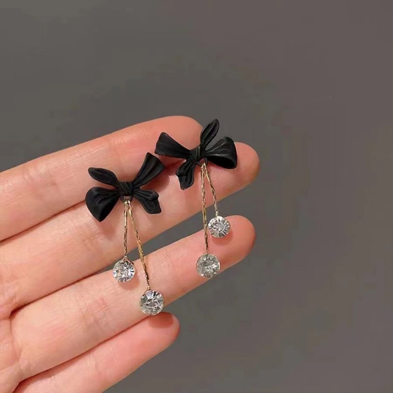 Fashionable small design elegant earrings with bow