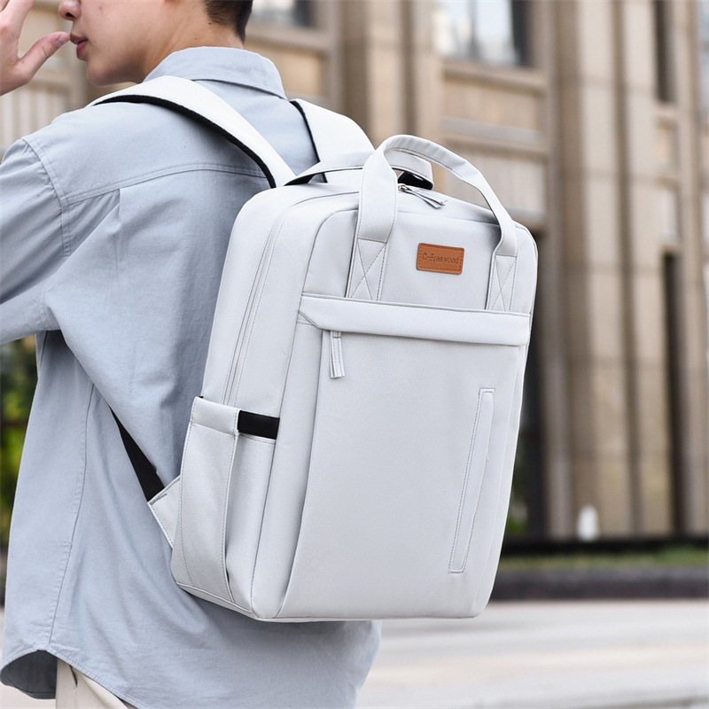 Populair nieuw model studentenrugzak, draagbare laptoptas, multifunctionele opbergruimte, effen kleur, eenvoudig ontwerp_voghion.com