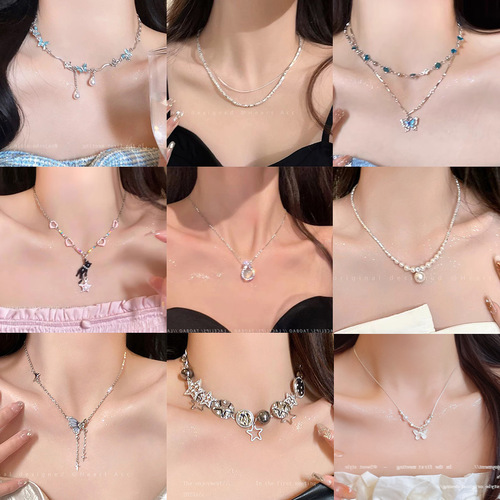 Korean high-end butterfly necklace women's niche light luxury versatile clavicle chain long popular imitation pearl sweater chain new