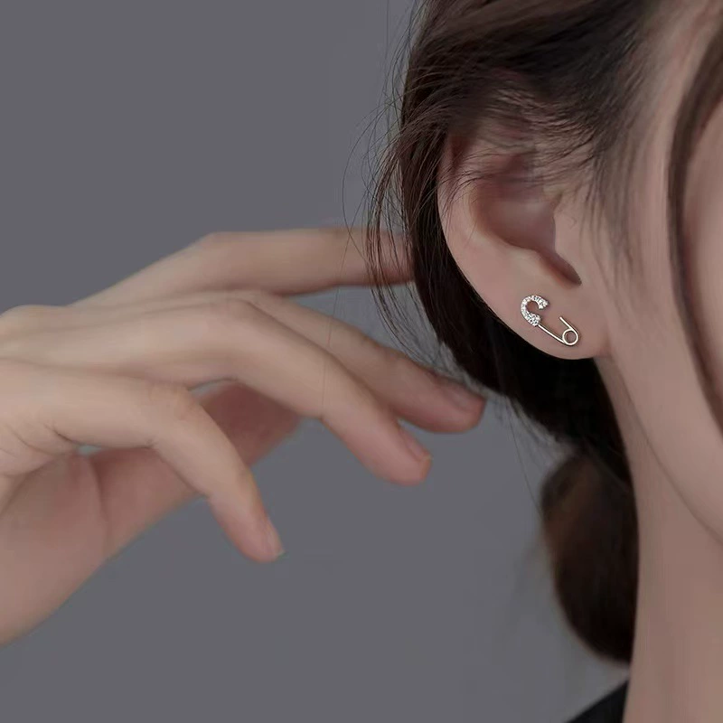 Pin, small design earrings, silver 925 sample, high-end