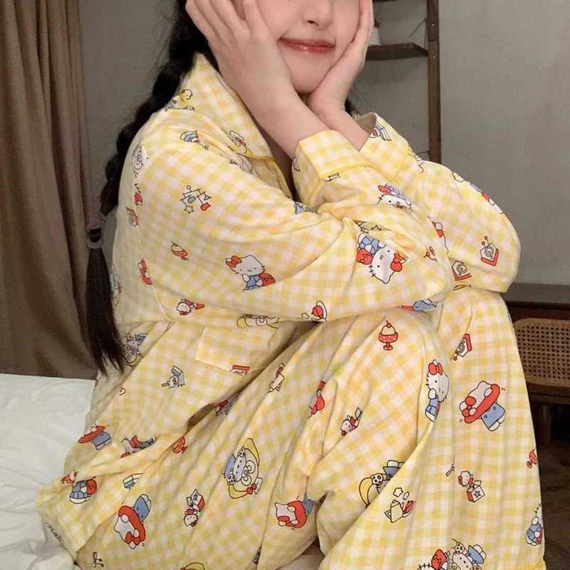 格子のハローキティのパジャマの女性春秋の新型の長袖のズボンの日系の漫画の部屋の服のスーツは外で着ることができます。|undefined