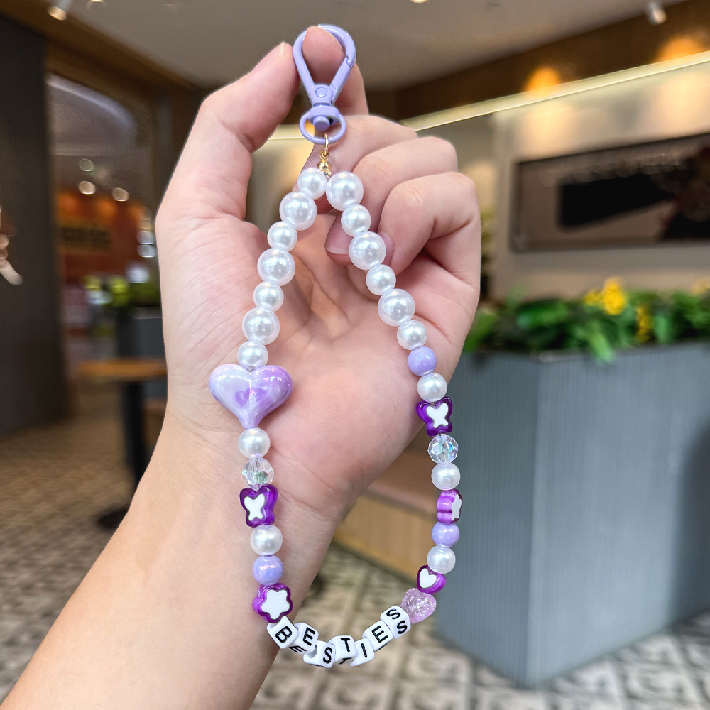 Nuevos productos transfronterizos creativos de letras de color cuerdas trenzadas llavero amor dibujos animados accesorios de diseño bolsos colgantes
