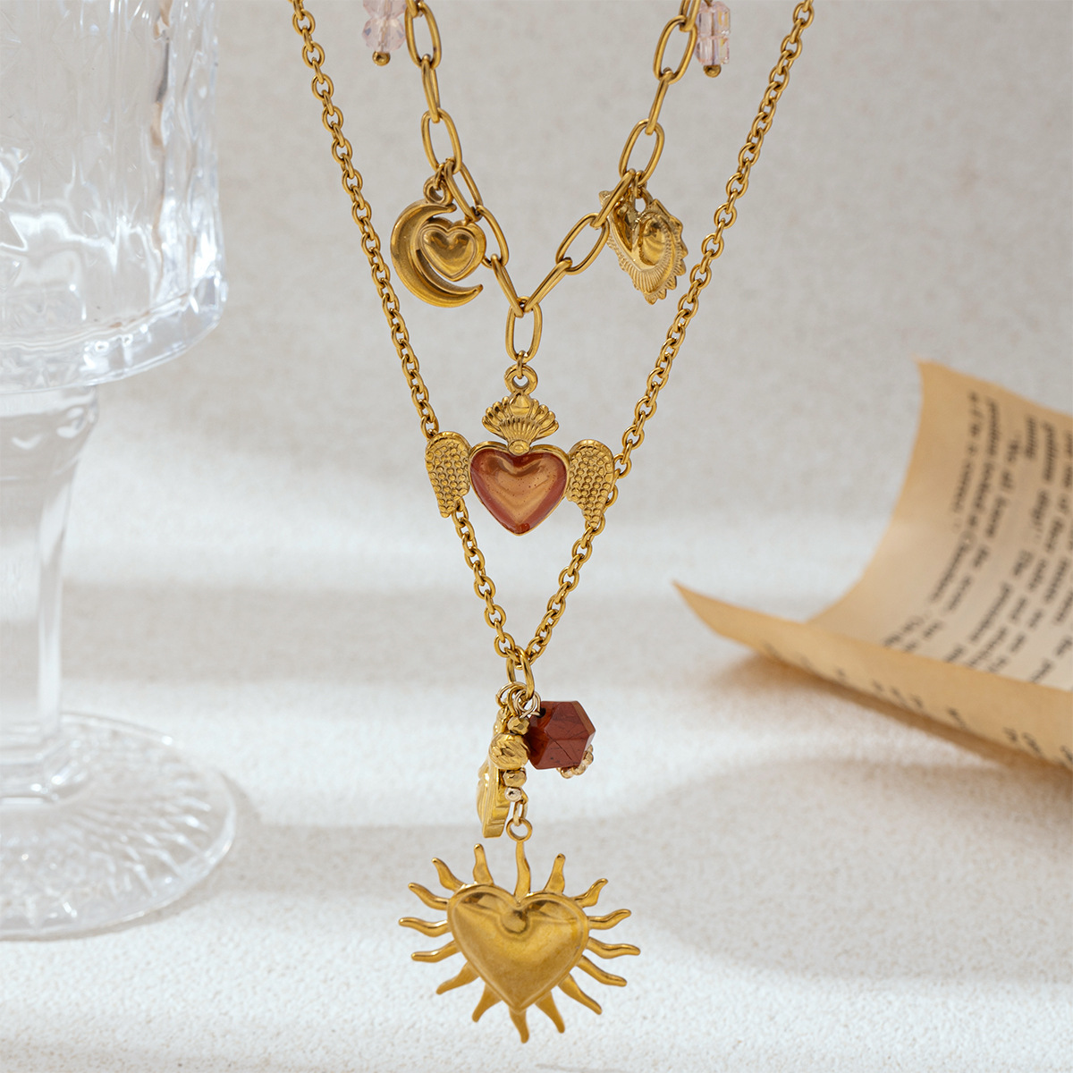 Collar de acero inoxidable TENA Europa y los Estados Unidos nicho ligero de lujo sol amor multi-colgante conjunto de joyería universal venta caliente transfronteriza