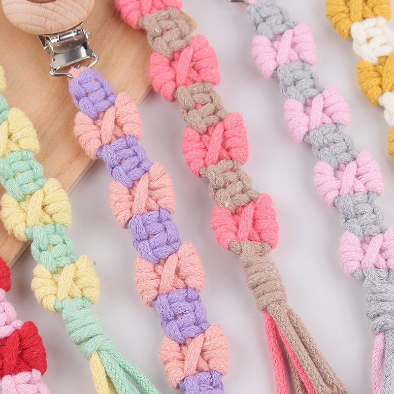 Productos para bebés de beech sonriente clip de tetina creativo puro tejido a mano cuerda de tetina de textura de arco anti-caída cadena