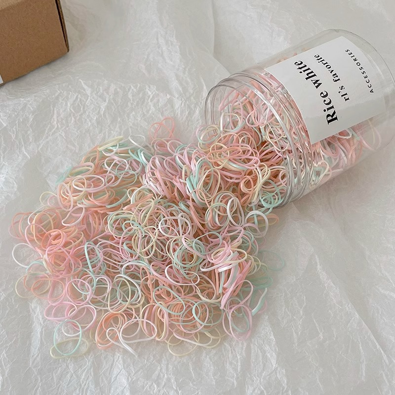 Cuerda para la cabeza con lazo para el cabello con cola de caballo para niños pequeños 2025 nueva banda de goma desechable para bebés cuerda para el cabello con funda de cuero pequeña duradera