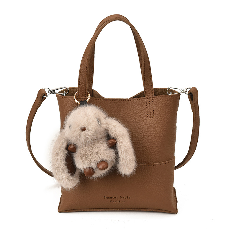 Bolso de cubo de mano coreano, bolso de hombro para mujeres extranjeras 2025, nuevo estilo de alta calidad, simple bolso de transporte