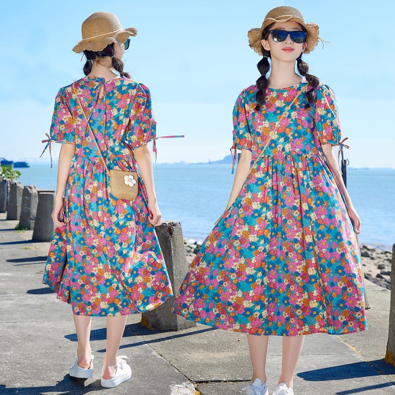 Vestido para niñas de manga corta Verano 2024 nuevo vestido de princesa artística suelta con estampado de flores para niños medianos y grandes