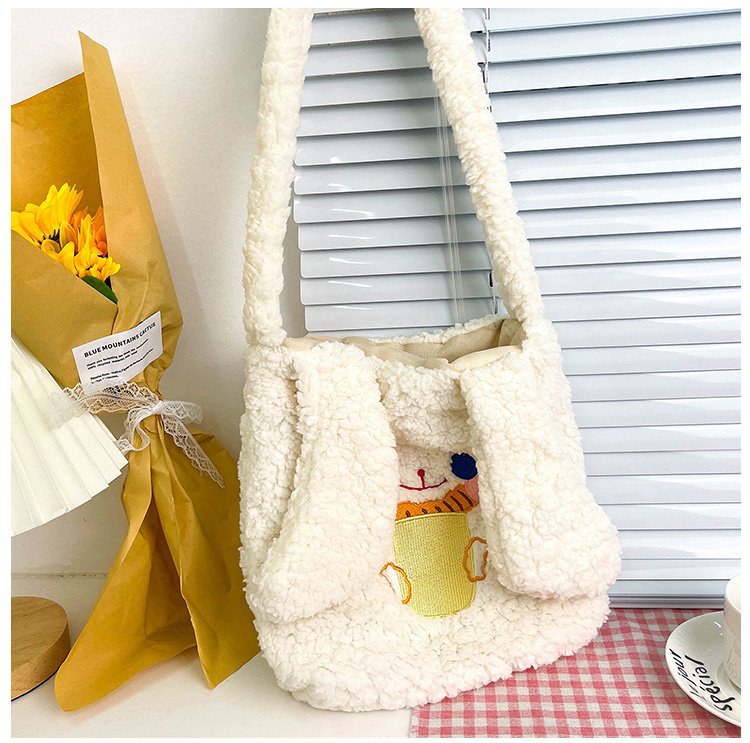 This autumn and winter hand-held bag with big ears, cute animal-embroidered fur, and a simple lambskin large-capacity student backpack undefined