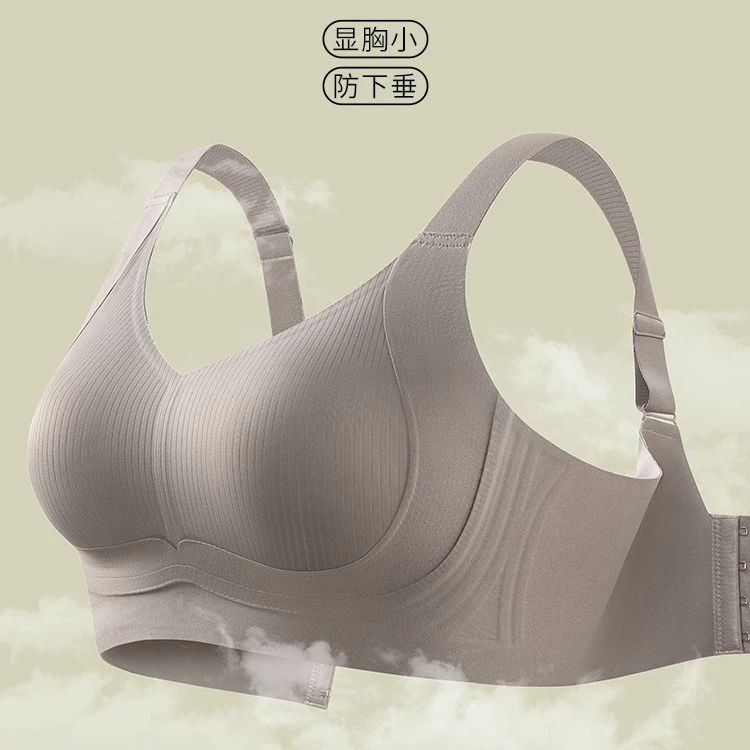 Большая грудь показывает маленькое бесшовное нижнее белье