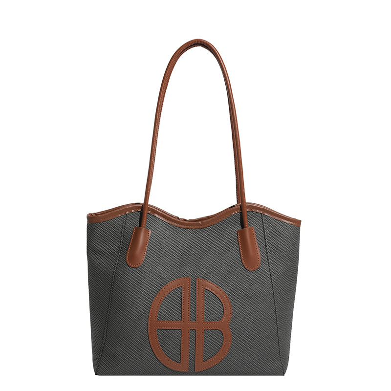 Bolsa de brazo de gran capacidad para viajar 2026 nueva moda bolso de mujer de alto nivel nicho bolso de hombro bolso especial para mujeres