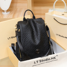 真皮编织双肩包女2024新款时尚夏天设计感小众旅行背包大容量书包