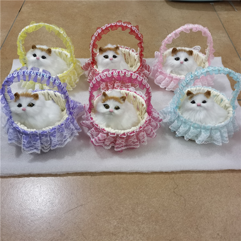 シミュレーション花かご猫は猫動物シミュレーション毛皮の置物観光地区の露店で子供のおもちゃのプレゼントを販売します。|undefined