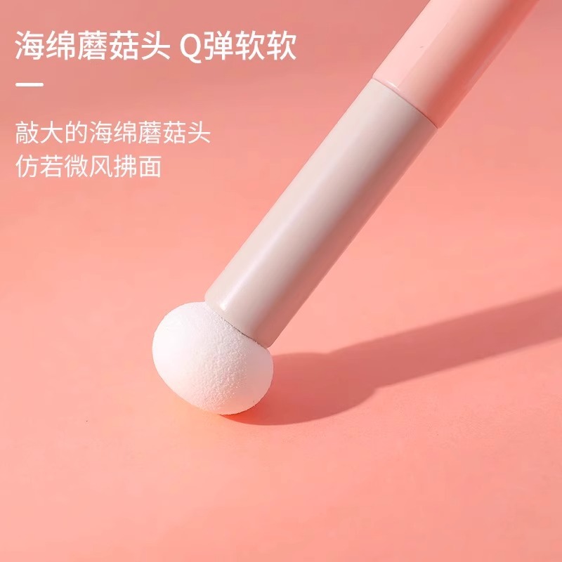 Cepillo de captura de hongos de captura de esponja de captura de lágrimas de cabeza redonda, círculo de ojos negro, patrón de decreto fino y suave, cepillo de maquillaje de pan al vapor
