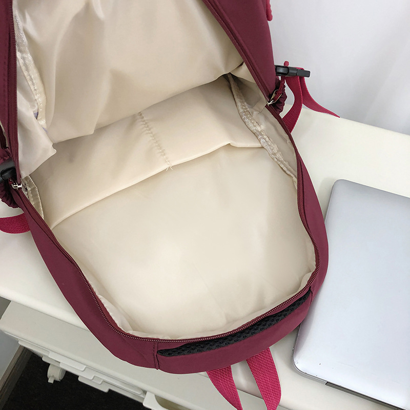 Al por mayor nueva escuela secundaria estudiante mochila hombres y mujeres de gran capacidad Moda mochila coreana casual viaje mochila