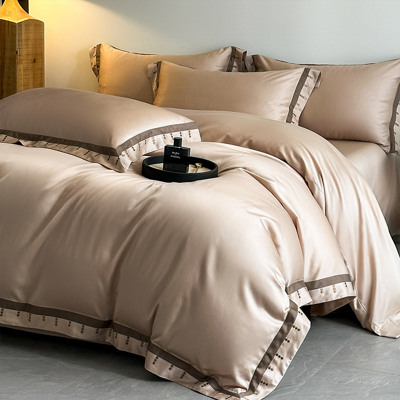 2025 nueva clase A 100 algodón de lana larga de Xinjiang algodón puro algodón de cuatro piezas ligero bordado de lujo algodón conjunto de cuatro piezas