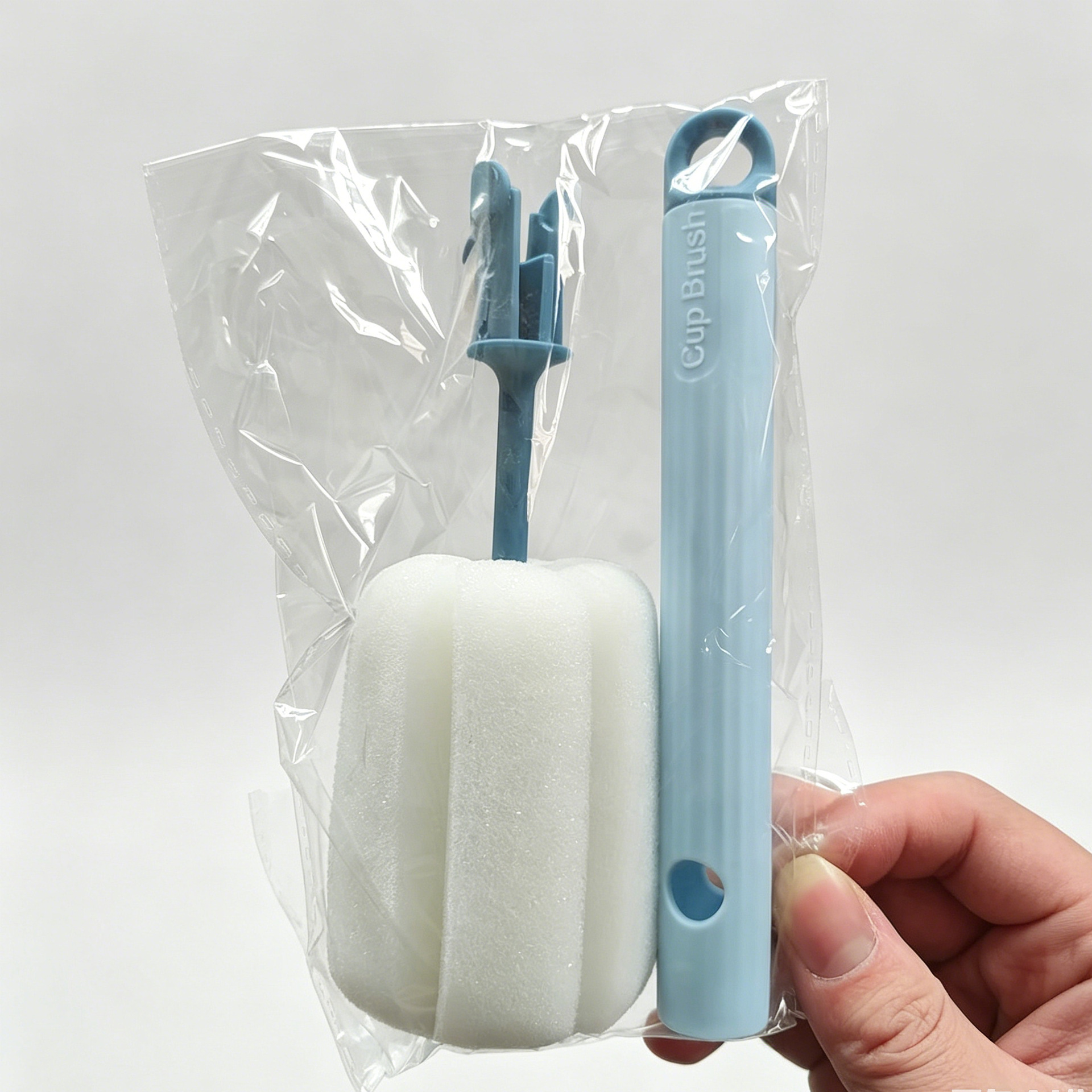 Cepillo para tazas de mango largo, nuevo modelo, cepillo de limpieza con esponja para el hogar con cabezal reemplazable para lavar tazas y platos.