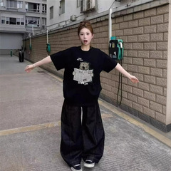 純綿の肩の黒い半袖のtシャツの女性の夏の2025新型の爆発的な爆発のアメリカのゆったりした小さい大衆の設計感の上着
