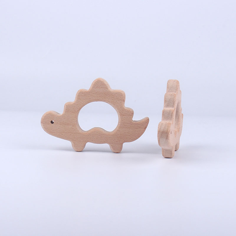 Nuevo bebé suministros haya animal dinosaurio juguete mordedor bebé molar mordedor pulsera DIY accesorios de la joyería