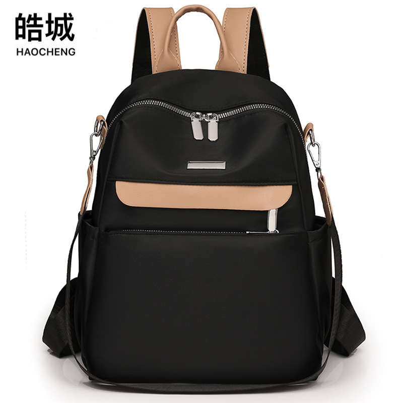 Bolsos mujer 2023 nueva mochila casual para mujer de nailon tendencia de moda mochila de viaje de color de contraste multifuncional