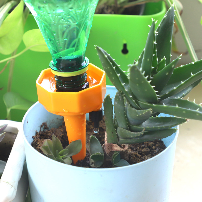 Nuevo fabricante de riego de flores ajustable goteo de agua flojo riego de flores de comercio exterior jardinería goteo libre de impuestos