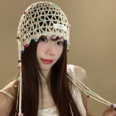 手作りの透かし彫りの帽子の女性の春の夏の薄い民族の風のフリンジカバーの帽子は顔の小さいニットの帽子を現します。