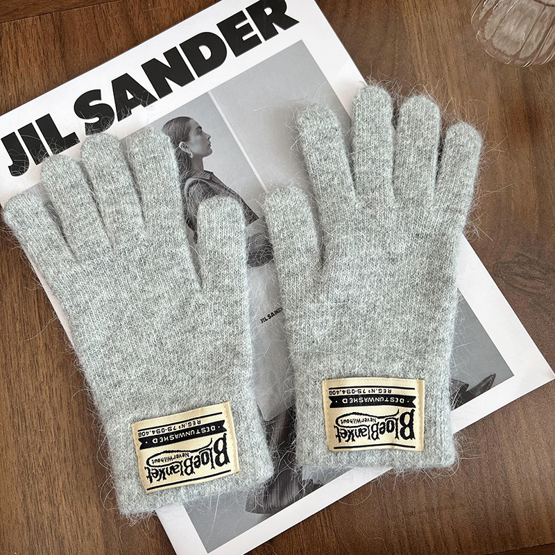 Guantes de invierno caliente estilo coreano de color sólido versátil guantes de lana de punto para mujeres a prueba de viento pantalla táctil guantes de dedos al por mayor