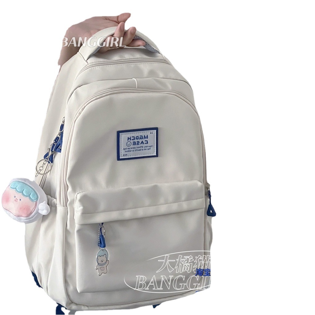 Mochila de los hombres simples ins mochila femenina de gran capacidad estudiante de la escuela secundaria estudiante de escuela secundaria mochila femenina al por mayor