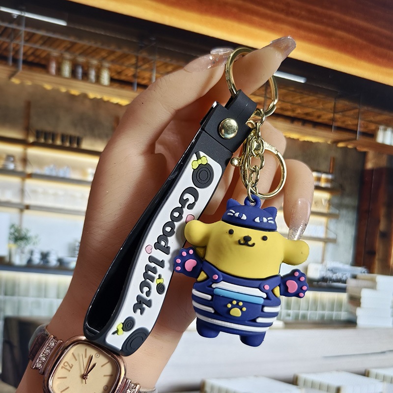 Perro de orejas grandes Melody KT gato pudín perro Kolomi caricatura de silicona llavero colgante bolsa colgante caja ciega regalo