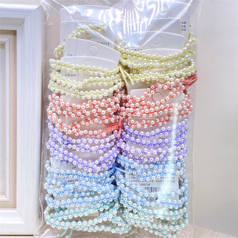 Diadema de perlas tejidas a mano de estilo coreano simple banda de pelo de niña fresca accesorios de pelo de moda de alta elasticidad para mujeres 2 yuanes