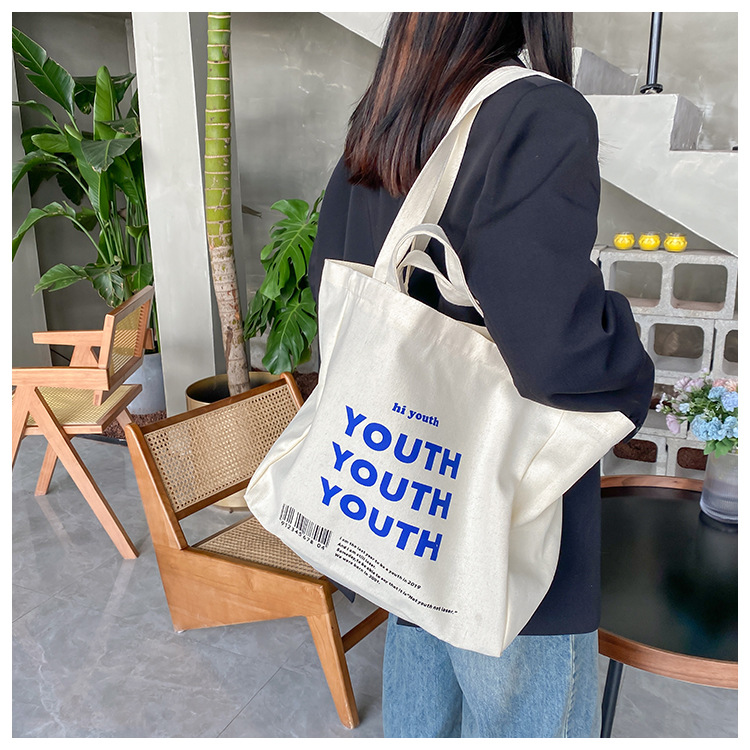 A large-capacity, sturdy Japanese-style canvas bag for women, a new 2022 simple bento handbag for girls to go to work undefined