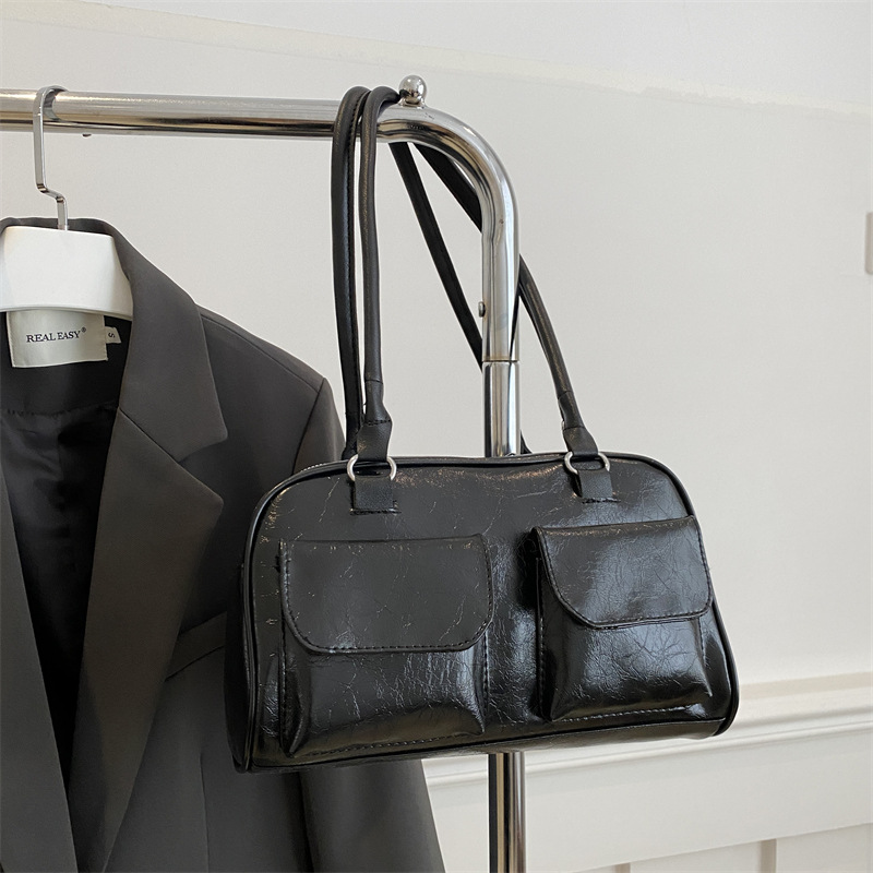 Bolsos para axilas de gran capacidad para viajeros otoño e invierno nueva moda retro nicho bolso de hombro casual de varios bolsillos