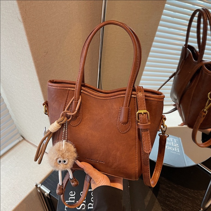 Bolso retro transfronterizo de alta calidad bolso de cubo de agua para mujeres otoño y invierno 2025 nuevo estilo versátil bolso de hombro bolso de moda