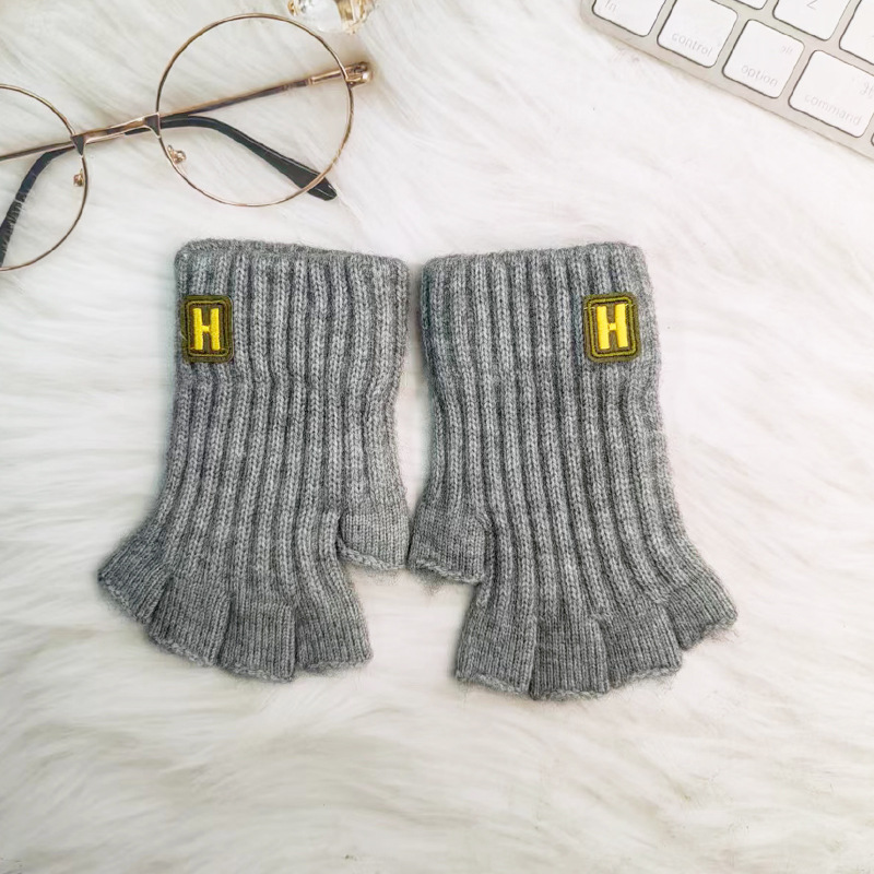 Guantes de otoño e invierno de los hombres de punto caliente a prueba de frío medio dedo aprendizaje montar ocio al aire libre simple moda coreano versátil estudiante