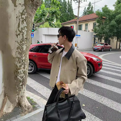 高級感のある韓系のファッションは色をひっくり返して皮のジャケットを合わせます。
