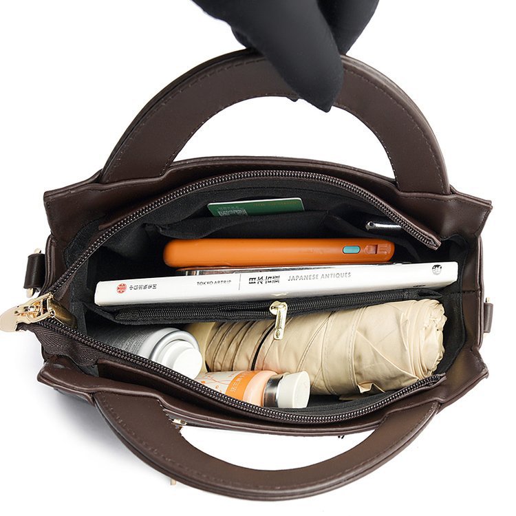 Bolso de mano de mujer mujer 2024 nueva moda atmósfera bolso de madres de mediana edad moda versátil simple bolsas de hombro