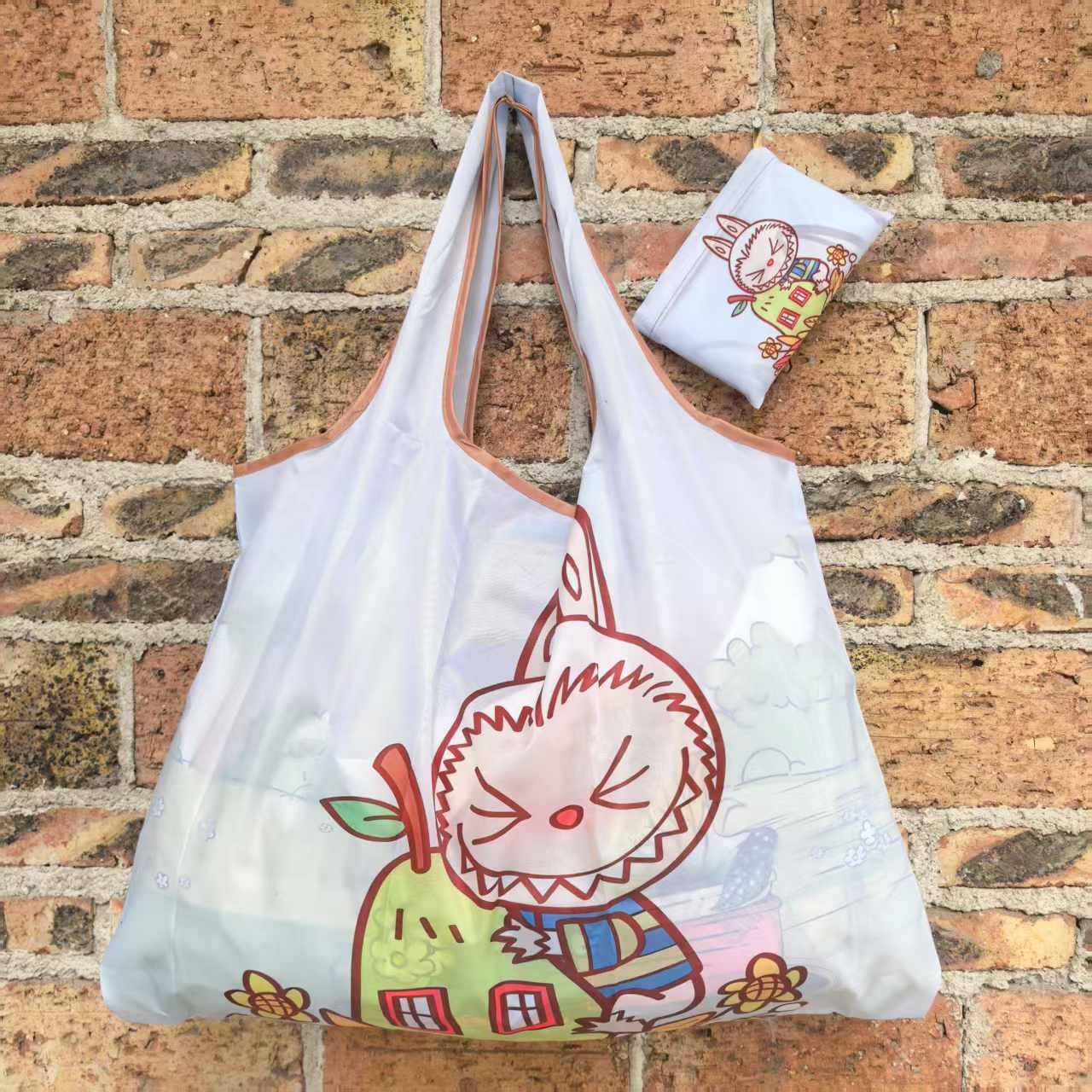 大型アニメスポット折り畳み環境保護レジ袋携帯袋が軽くて、野菜バッグを買って収納するファッションを繰り返している
