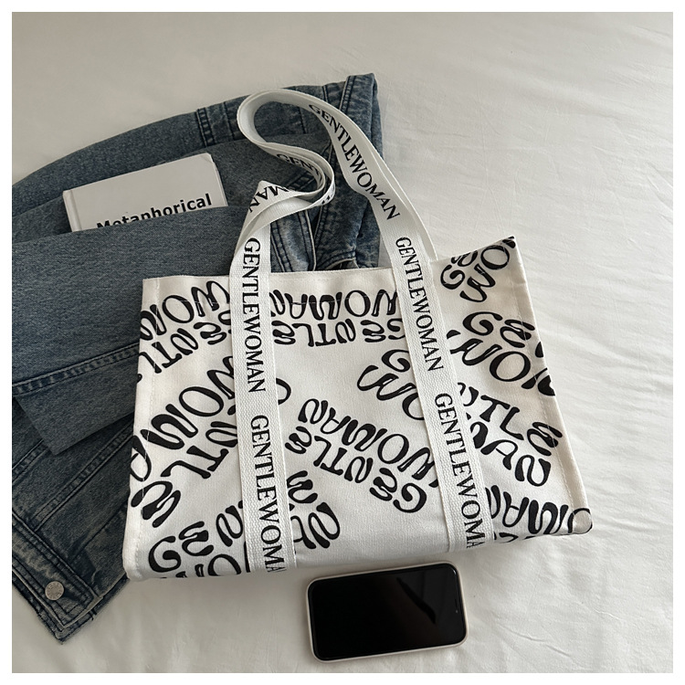 Large-capacity letter canvas bag 2025 new style ins printed versatile shoulder bag for commuting and portable ladies' tote bag undefined